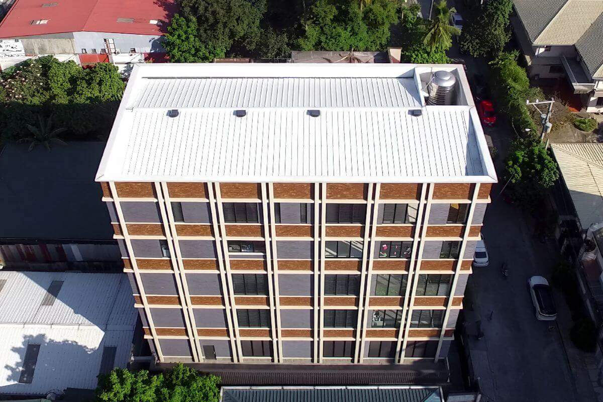 A building with insulated roofing from Metalink helping with external heat sources