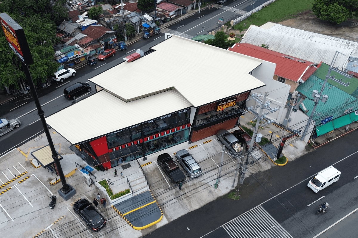 What Is the Ideal Roof Insulation for Tropical Countries Like the Philippines? Metalink roof installed on a commercial establishment, showcasing durable roofing solutions with reliable weather protection and modern design.