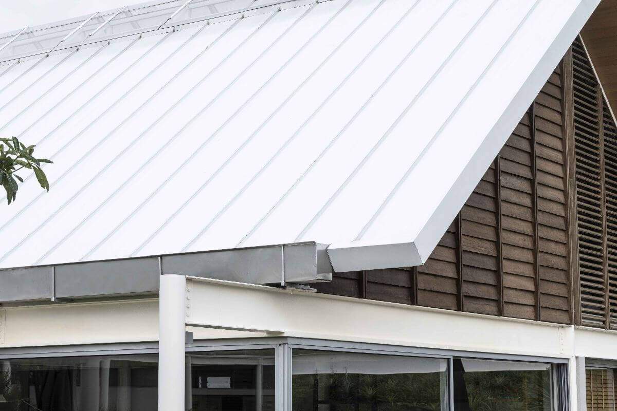 White Metalink Flexseam roof panel installed for durable weather protection, modern aesthetics, and long-lasting roofing performance.