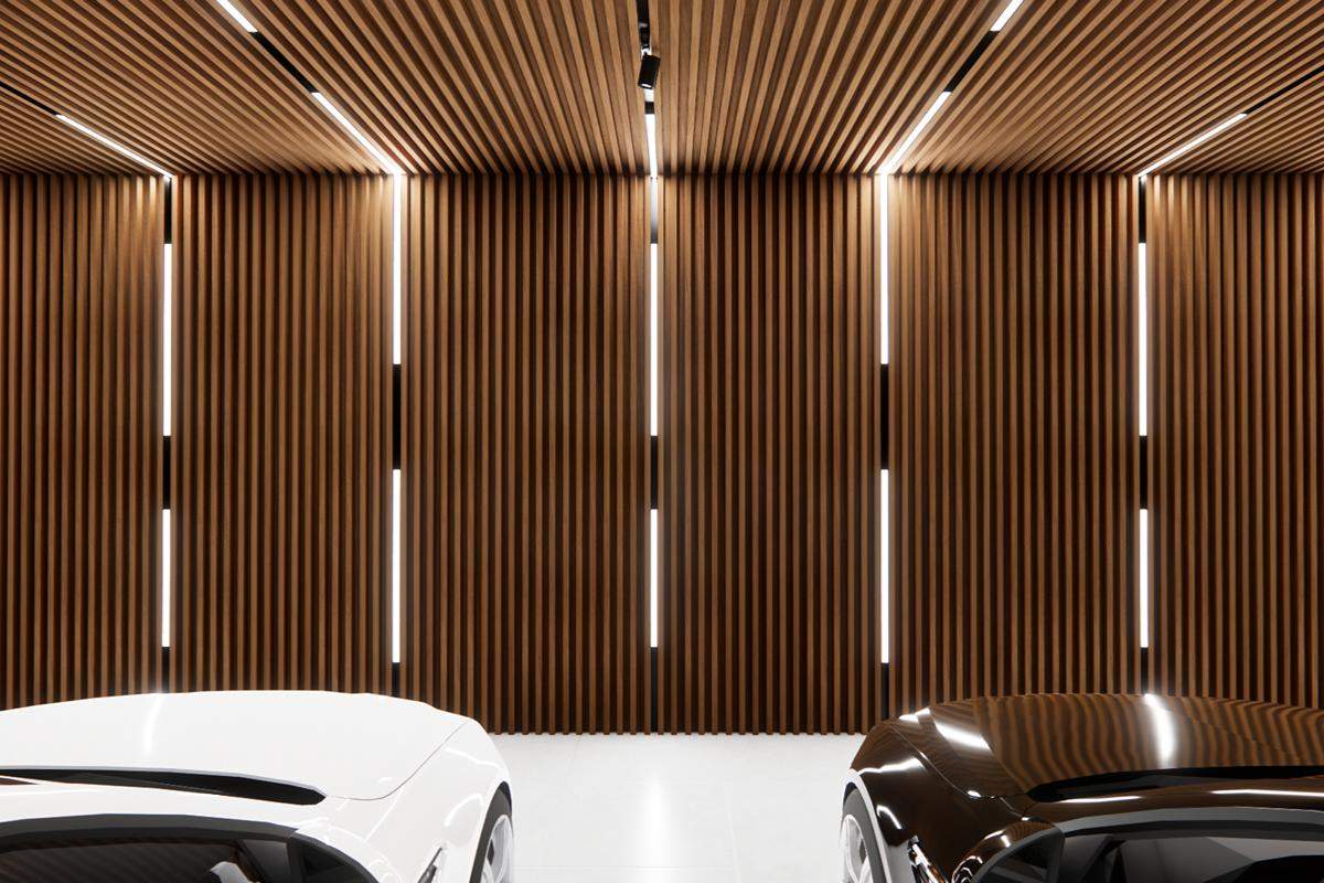 Wood-look metal wall and ceiling cladding with integrated lighting inside a modern vehicle showroom